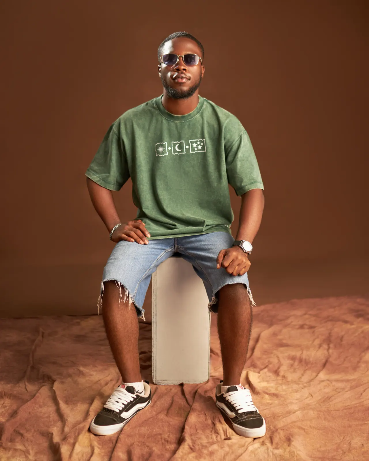 Kairova 224 Olive Tee, Seated Studio Shoot